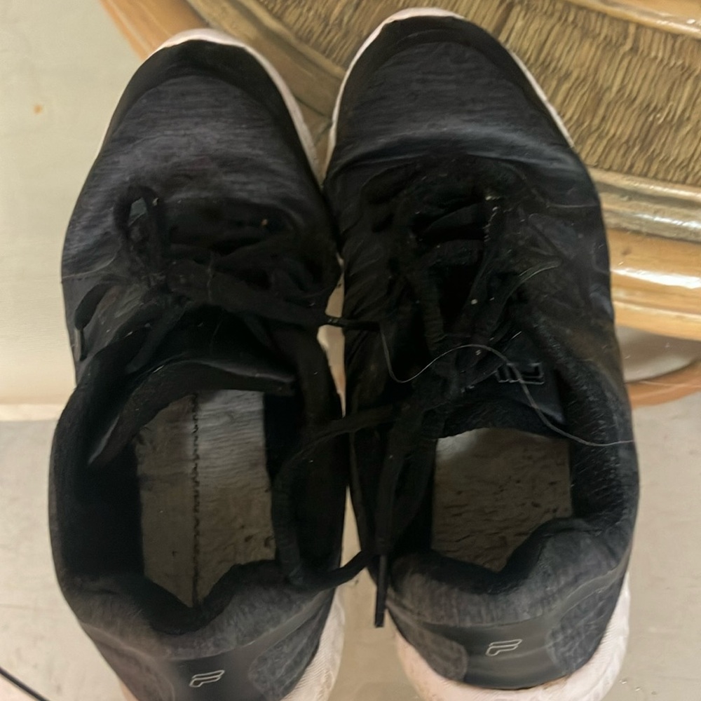 Used Fila tennis shoes size 7 1/2. Decent condition